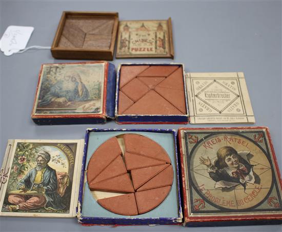 Three late 19th century Tangram puzzles, consisting: The Chinese Puzzle, mahogany pieces and box with sliding lid; a Richter puzzle -